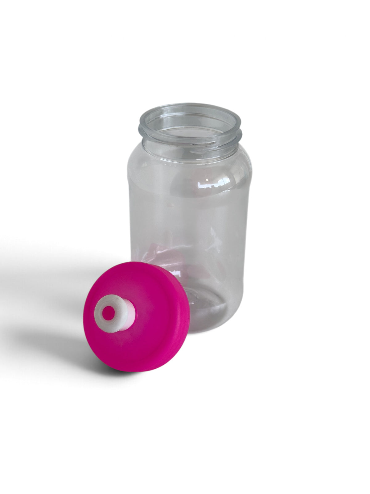 Cilindro transparente de 500 ml en PET ligero con tapa tipo chupón en variedad de colores personalizado con vinil.